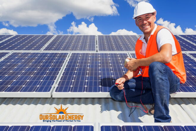 solar panel technician on roof